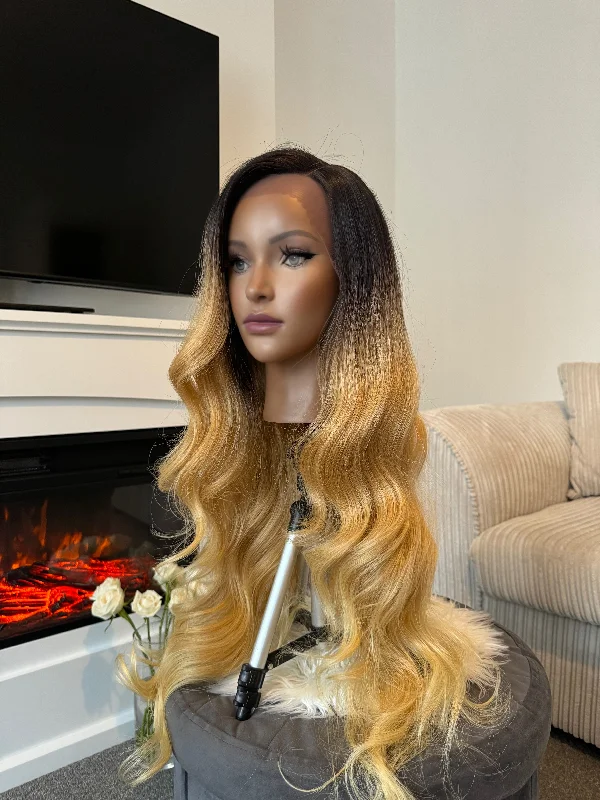 Lace wig with a wispy fringe for a soft and feminine lookCleo 28" Honey Blonde Synthetic Lace Front Wig Lace wig with a wispy fringe for a soft and feminine lookCleo 28" Honey Blonde Synthetic Lace Front Wig