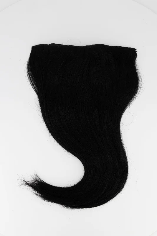 Clip - in hair extensions with a wavy texture for a beachy and relaxed lookJet Black Clip-in Hair Extensions Clip - in hair extensions with a wavy texture for a beachy and relaxed lookJet Black Clip-in Hair Extensions