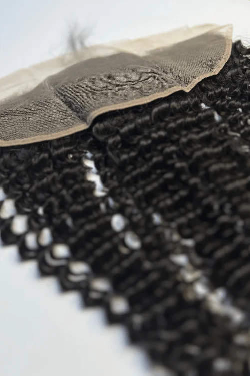 Glueless wig with a natural - looking root for a more realistic lookBrazilian Frontal - Kinky Curl Glueless wig with a natural - looking root for a more realistic lookBrazilian Frontal - Kinky Curl